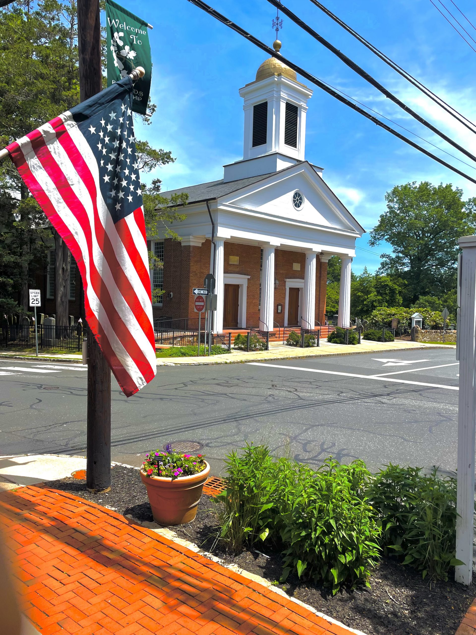 church-with-flag-from-office-scaled.jpg